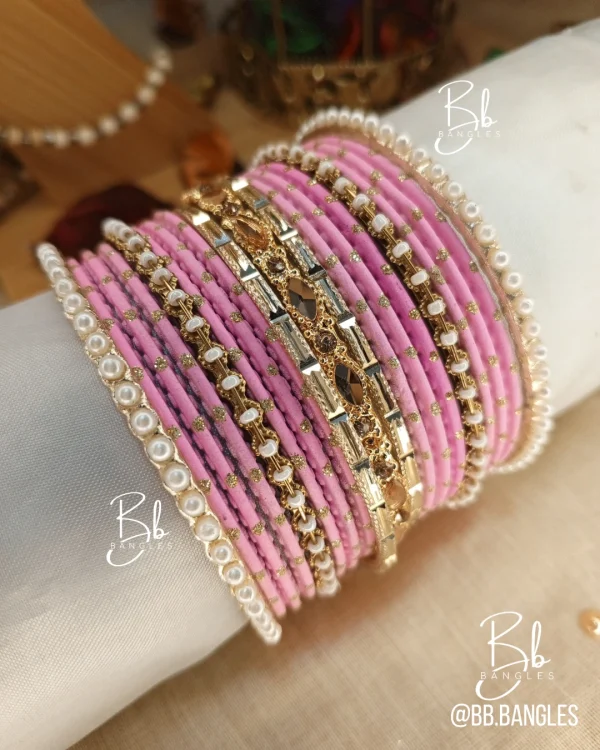 Mehak is a graceful handcrafted ensemble featuring Matt Metal Dot Glitter Bangels and intricate flower copper plated Kara for a classic, feminine aesthetic. Anchored by a thin Pearl and Nug Karay this set is specifically designed for festive afternoon events like Eid or Mehndi where a detailed, heritage-inspired look is desired. Crafted from premium brass and copper alloys, it provides a high-end feel with a lightweight fit for effortless, long-duration wear.
