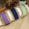 Add a touch of modern sophistication to your festive wardrobe with our Chic Collection. These sets feature a solid colors Matt Dot litter Bangles, accomapnied by thin Pearl Karay and Kut Pearl Karay. Whether you're dressing up for Eid celebrations or looking for the perfect bridesmaid gift, these sets offer a sleek, high-fashion alternative to traditional heavy jewelry